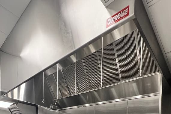 Commercial fire suppression system for restaurant kitchens